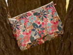Cosmetic bag with flap cerise en fleur