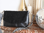 Flap of shoulder bag moumoute noire