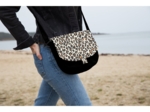 Flap of small shoulder bag leopard