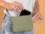 Tiny coton clutch bag almond green with golden dots gauze