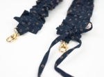 Ruffled phone strap bulle bronze marine