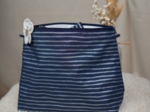 Cosmetic bag with flap striped silver dark blue