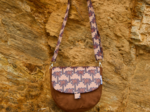 Flap of small shoulder bag palmeraie